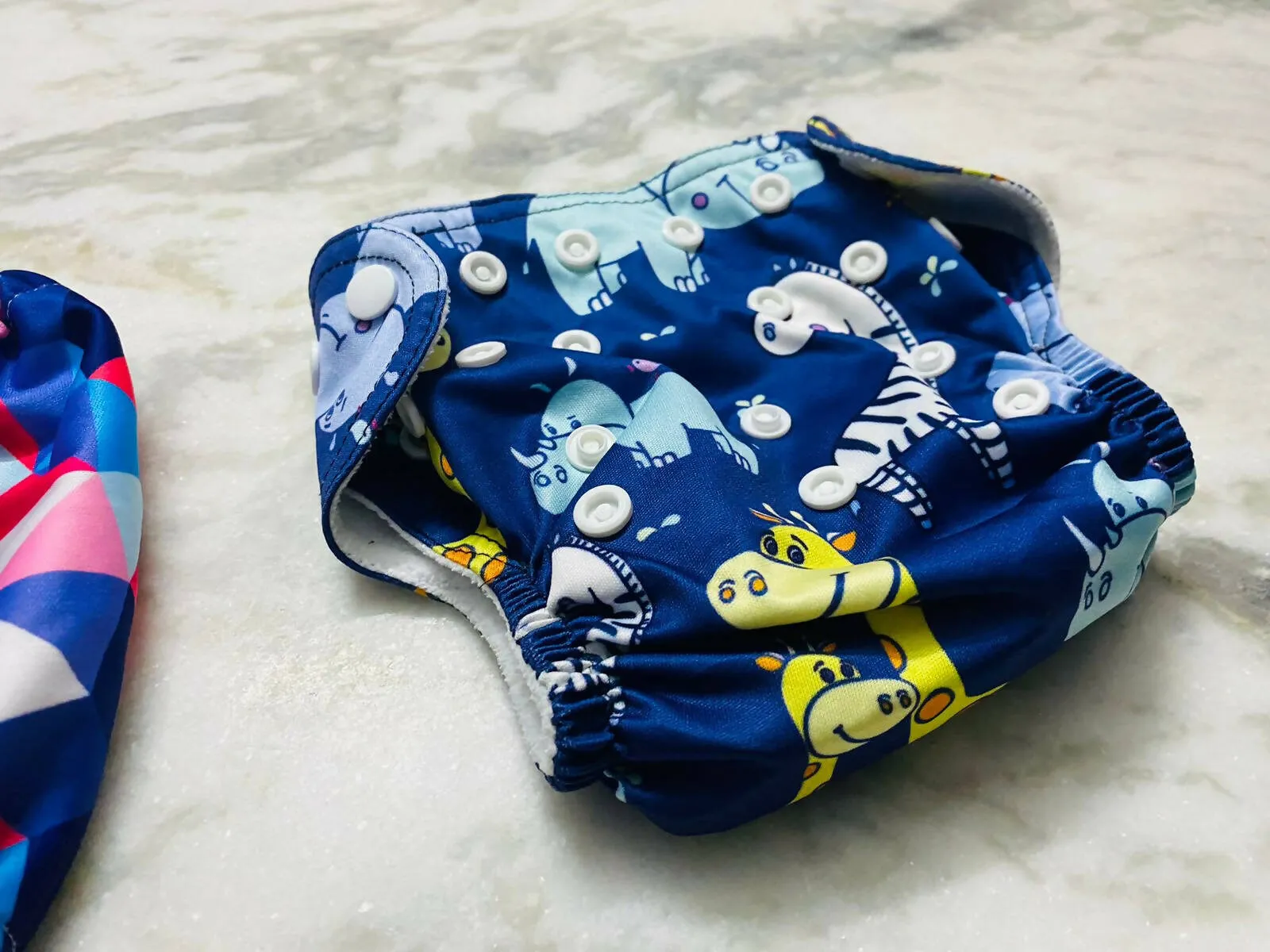 5 Cloth Diapers and 6 Pads for Baby